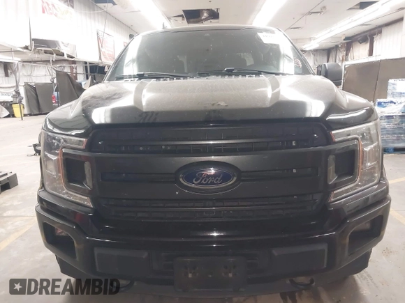 2019 Ford F-150 XL with VIN 1FTEW1E44KKD27658, listed as a IAAI auction lot 41916952 with 82,428 mi miles and . Bid and sale history available at DreamBid. Image 12.