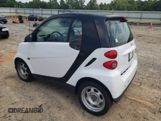 2009 Smart fortwo Pure with VIN WMEEJ31X19K216555, listed as a Copart auction lot 64412765 with 74,152 mi miles and Clean title. Bid and sale history available at DreamBid. Image 2.