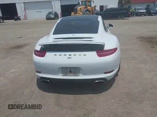 2015 Porsche 911 Carrera z VIN WP0AA2A90FS100123, wystawiony jako IAAI lot #42339229 z przebiegiem 135 198 mil mil oraz . Historia ofert i sprzedaży dostępna na DreamBid. Obrazek 16.
