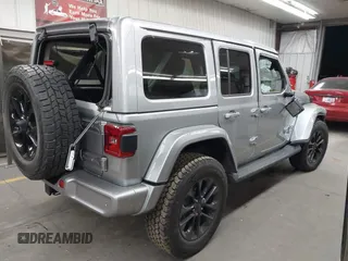 2021 Jeep Wrangler Unlimited Sahara with VIN 1C4HJXEN1MW529568, listed as a IAAI auction lot 42336590 with 39,931 mi miles and . Bid and sale history available at DreamBid. Image 4.