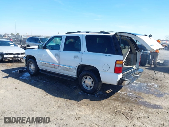 2003 GMC Yukon SLT with VIN 1GKEC13Z13J197955, listed as a IAAI auction lot 41586841 with 208,752 mi miles. Bid and sale history available at carsss.com. Image 3.