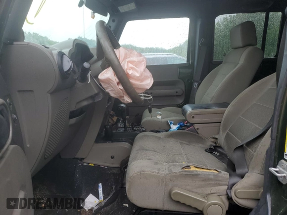 2007 Jeep Wrangler Unlimited Sahara с VIN 1J4GA59107L141710, выставлен на аукционе Copart как лот 59939755 с пробегом 212 659 миль миль и Списание • Salvage title. История ставок и продаж доступна на DreamBid. Изображение 7.