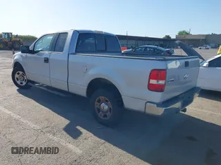 2004 Ford F-150 XL with VIN 1FTPX12594NA32477, listed as a IAAI auction lot 42088113 with 266,389 mi miles. Bid and sale history available at carsss.com. Image 3.