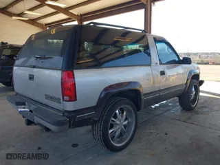 1996 Chevrolet Tahoe with VIN 3GNEK18R5TG157667, listed as a IAAI auction lot 41677181 with 190,849 mi miles. Bid and sale history available at carsss.com. Image 4.