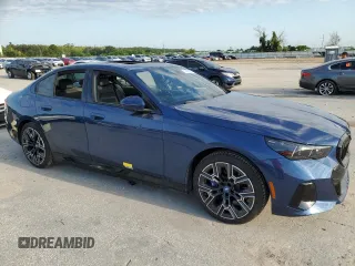 2024 BMW i5 eDrive40 with VIN WBY33FK00RCR76973, listed as a Copart auction lot 67562934 with 4,315 mi miles and Salvage Title. Bid and sale history available at carsss.com. Image 4.
