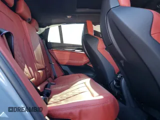 2024 BMW X4 M z VIN 5YM23EC01R9W18369, wystawiony jako Copart lot #82886254 z przebiegiem Nie podano mil oraz Szkoda całkowita • Salvage title. Historia ofert i sprzedaży dostępna na DreamBid. Obrazek 11.