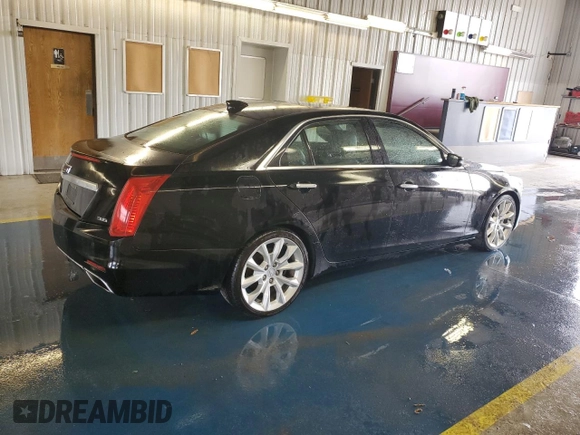 2015 Cadillac CTS Premium AWD z VIN 1G6AZ5S3XF0127669, wystawiony jako Copart lot #56314865 z przebiegiem 211 973 mil mil oraz Czysty tytuł • Clean title. Historia ofert i sprzedaży dostępna na DreamBid. Obrazek 3.