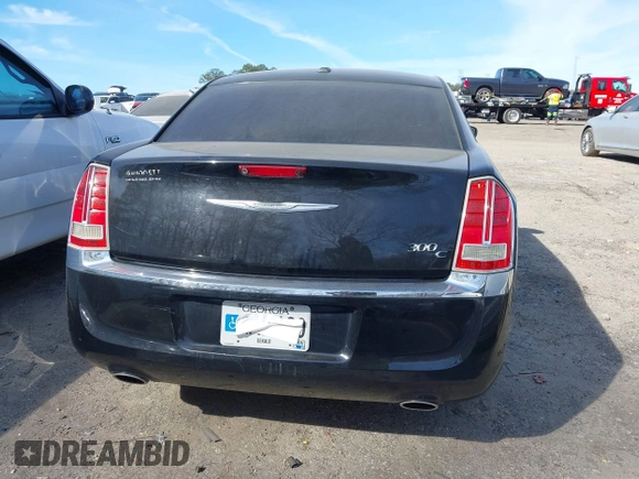 2014 Chrysler 300 with VIN 2C3CCAEG5EH365362, listed as a IAAI auction lot 41835374 with 223,751 mi miles. Bid and sale history available at carsss.com. Image 16.
