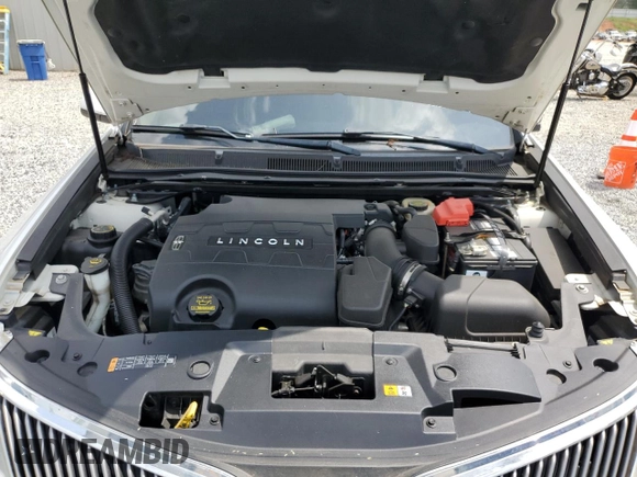 2013 Lincoln MKS with VIN 1LNHL9DK4DG612981, listed as a Copart auction lot 60701895 with 113,354 mi miles and Salvage title. Bid and sale history available at DreamBid. Image 11.