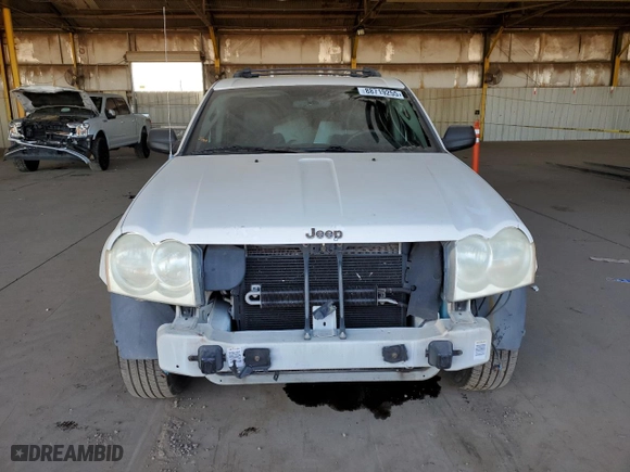 2005 Jeep Grand Cherokee Laredo with VIN 1J4HS48N75C585292, listed as a Copart auction lot 88719255 with 140,341 mi miles and Salvage Title. Bid and sale history available at carsss.com. Image 5.