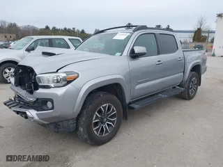 2020 Toyota Tacoma 4WD SR5 with VIN 3TMCZ5AN6LM306311, listed as a IAAI auction lot 41220025 with 67,806 mi miles. Bid and sale history available at carsss.com. Image 18.