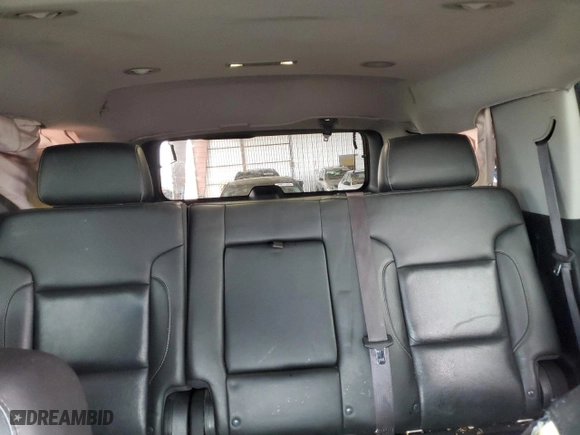 2016 Chevrolet Tahoe LTZ with VIN 1GNSKCKC2GR277192, listed as a Copart auction lot 49552145 with 131,659 mi miles and Salvage Title. Bid and sale history available at carsss.com. Image 10.