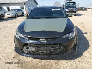 2016 Scion tC z VIN JTKJF5C79GJ014274, wystawiony jako Copart lot #49000685 z przebiegiem 83 607 mil mil oraz Szkoda całkowita • Salvage title. Historia ofert i sprzedaży dostępna na DreamBid. Obrazek 5.