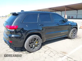 2020 Jeep Grand Cherokee Trackhawk with VIN 1C4RJFN96LC336561, listed as a IAAI auction lot 41991800 with 58,781 mi miles and . Bid and sale history available at DreamBid. Image 4.