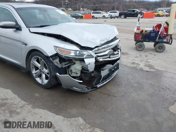 2012 Ford Taurus SHO z VIN 1FAHP2KT6CG142954, wystawiony jako IAAI lot #41526760 z przebiegiem 187 887 mil mil oraz . Historia ofert i sprzedaży dostępna na DreamBid. Obrazek 17.