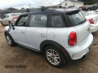 2015 MINI Cooper Countryman S with VIN WMWZC5C51FWP48214, listed as a IAAI auction lot 42102174 with 181,917 mi miles. Bid and sale history available at carsss.com. Image 3.