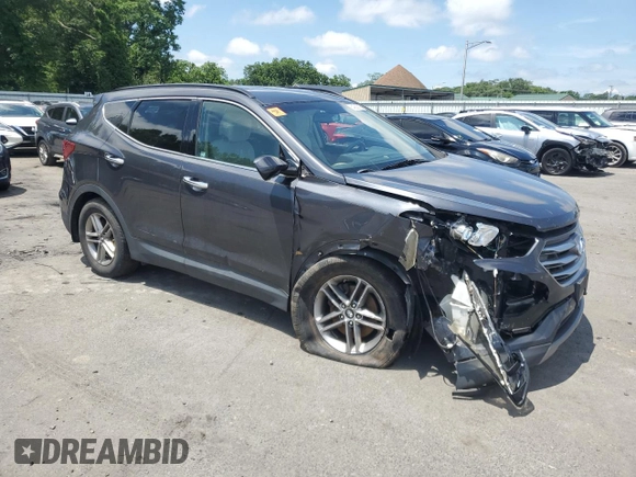 2017 Hyundai Santa Fe 2.4L z VIN 5XYZUDLB8HG430221, wystawiony jako Copart lot #64330015 z przebiegiem 151 318 mil mil oraz Szkoda całkowita • Salvage title. Historia ofert i sprzedaży dostępna na DreamBid. Obrazek 4.