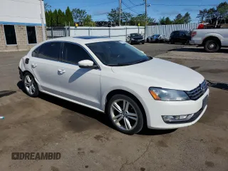 2014 Volkswagen Passat SE z VIN 1VWBN7A30EC022997, wystawiony jako Copart lot #57582285 z przebiegiem 94 920 mil mil oraz Szkoda całkowita • Salvage title. Historia ofert i sprzedaży dostępna na DreamBid. Obrazek 4.