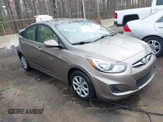 2014 Hyundai Accent GLS with VIN KMHCT4AE8EU666153, listed as a IAAI auction lot 41908665 with 115,785 mi miles. Bid and sale history available at carsss.com. Image 1.