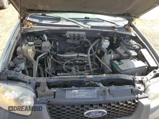 2005 Ford Escape XLS Value with VIN 1FMYU92Z45KE32184, listed as a Copart auction lot 52211135 with 149,533 mi miles and Clean title. Bid and sale history available at DreamBid. Image 12.