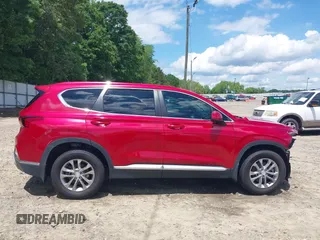 2020 Hyundai Santa Fe SE with VIN 5NMS23AD0LH154797, listed as a IAAI auction lot 42191317 with 80,526 mi miles and . Bid and sale history available at DreamBid. Image 14.