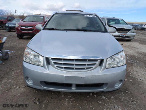 2006 Kia Spectra EX with VIN KNAFE121265232244, listed as a Copart auction lot 51787885 with 141,259 mi miles and Salvage Title. Bid and sale history available at carsss.com. Image 5.