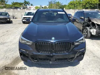 2020 BMW X5 M50i with VIN 5UXJU4C00L9C54563, listed as a Copart auction lot 56119764 with 65,963 mi miles. Bid and sale history available at carsss.com. Image 5.