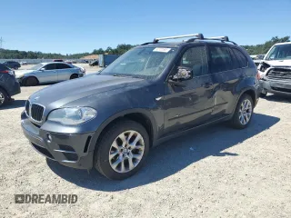 2012 BMW X5 35i z VIN 5UXZV4C59CL990865, wystawiony jako Copart lot #56732665 z przebiegiem 107 375 mil mil oraz Szkoda całkowita • Salvage title. Historia ofert i sprzedaży dostępna na DreamBid. Obrazek 1.