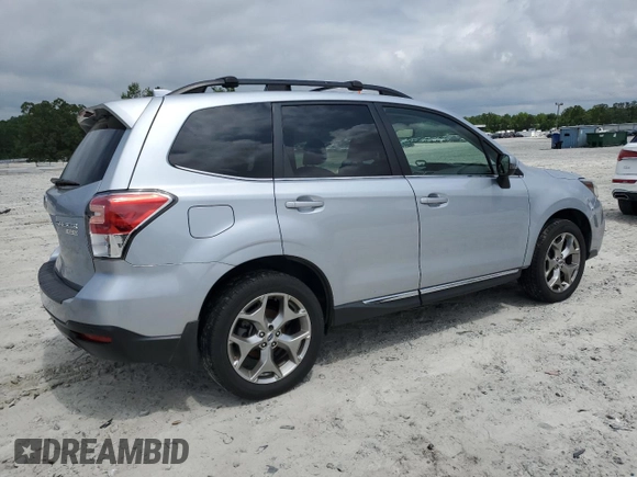 2017 Subaru Forester Touring with VIN JF2SJAWC6HH556728, listed as a Copart auction lot 54914055 with 112,686 mi miles and Salvage title. Bid and sale history available at DreamBid. Image 3.