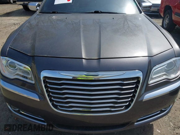 2013 Chrysler 300 C with VIN 2C3CCAKT2DH567348, listed as a IAAI auction lot 41909284 with 110,710 mi miles and . Bid and sale history available at DreamBid. Image 6.