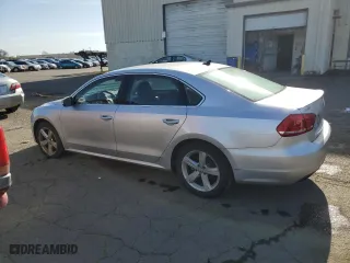 2014 Volkswagen Passat SE with VIN 1VWBP7A38EC008825, listed as a Copart auction lot 51813885 with 197,754 mi miles and Clean Title. Bid and sale history available at carsss.com. Image 2.