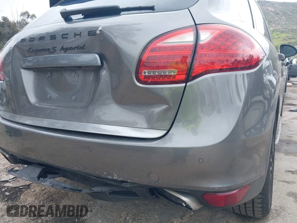 2012 Porsche Cayenne S Hybrid with VIN WP1AE2A25CLA90636, listed as a IAAI auction lot 41922089 with 90,318 mi miles and . Bid and sale history available at DreamBid. Image 6.