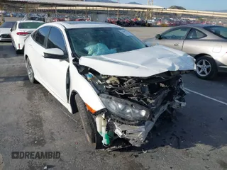 2017 Honda Civic EX z VIN 2HGFC2F76HH573639, wystawiony jako IAAI lot #41807311 z przebiegiem 140 431 mil mil oraz . Historia ofert i sprzedaży dostępna na DreamBid. Obrazek 1.