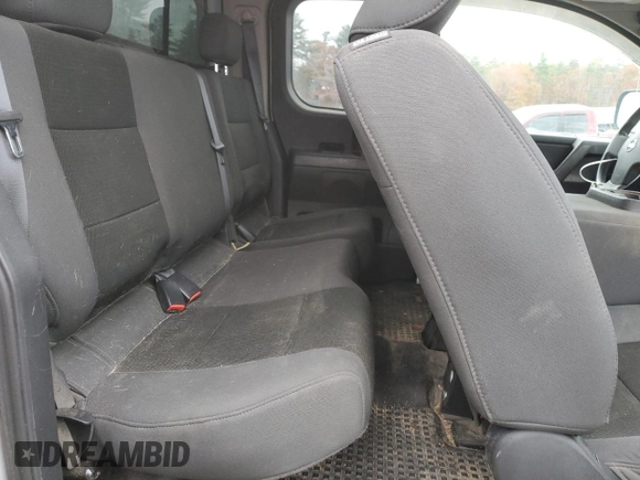 2011 Nissan Titan S z VIN 1N6AA0CJ7BN322207, wystawiony jako Copart lot #77558164 z przebiegiem 177 105 mil mil oraz Szkoda całkowita • Salvage title. Historia ofert i sprzedaży dostępna na DreamBid. Obrazek 11.