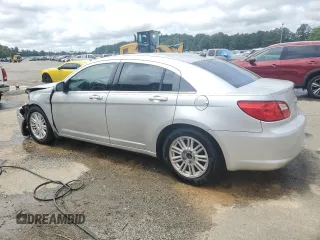 2009 Chrysler Sebring Touring z VIN 1C3LC56B39N501219, wystawiony jako Copart lot #56197905 z przebiegiem 138 442 mil mil oraz Szkoda całkowita • Salvage title. Historia ofert i sprzedaży dostępna na DreamBid. Obrazek 2.