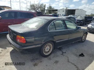 2000 BMW 5 Series 528iA with VIN WBADM6340YGU16735, listed as a Copart auction lot 77249644 with 0 mi miles and Salvage Title. Bid and sale history available at carsss.com. Image 3.