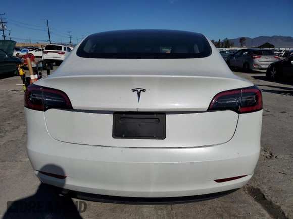 2023 Tesla Model 3 with VIN 5YJ3E1EA7PF557358, listed as a Copart auction lot 48891985 with 20,673 mi miles and Salvage title. Bid and sale history available at DreamBid. Image 6.