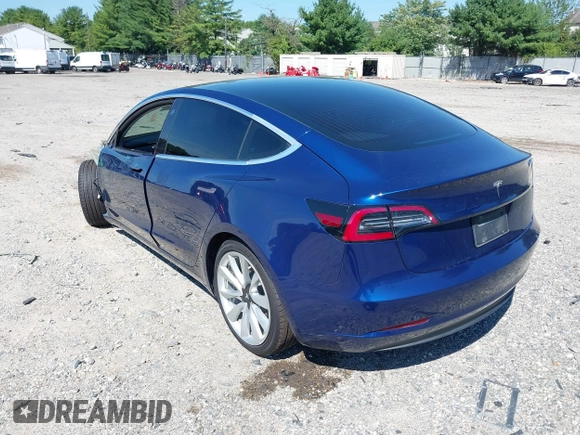2019 Tesla Model 3 Mid Range with VIN 5YJ3E1EA6KF402308, listed as a IAAI auction lot 40077902 with 89,794 mi miles and . Bid and sale history available at carsss.com. Image 3.