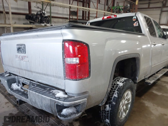 2018 GMC Sierra 1500 SLE z VIN 1GTV2MEH8JZ357073, wystawiony jako IAAI lot #41642234 z przebiegiem 105 007 mil mil oraz . Historia ofert i sprzedaży dostępna na DreamBid. Obrazek 4.
