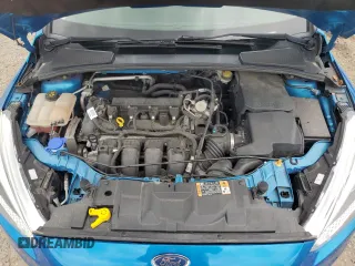 2016 Ford Focus SE z VIN 1FADP3F21GL386580, wystawiony jako Copart lot #63326425 z przebiegiem 82 139 mil mil oraz Szkoda całkowita • Salvage title. Historia ofert i sprzedaży dostępna na DreamBid. Obrazek 11.