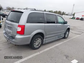 2013 Chrysler Town & Country Touring-L with VIN 2C4RC1CG0DR684329, listed as a IAAI auction lot 41919921 with 101,868 mi miles. Bid and sale history available at carsss.com. Image 4.