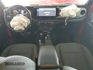 2024 Jeep Wrangler Sport S with VIN 1C4PJXDN5RW210582, listed as a Copart auction lot 47043845 with 18,593 mi miles and Salvage title. Bid and sale history available at DreamBid. Image 8.