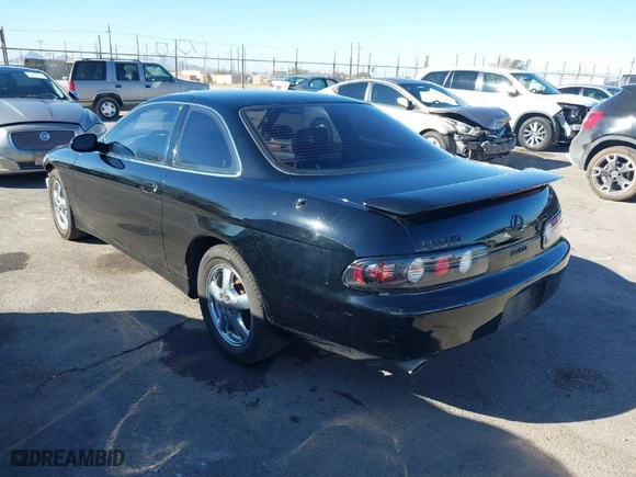 1999 Lexus SC 400 Luxury Sport Cpe with VIN JT8CH32Y4X1002413, listed as a IAAI auction lot 41331493 with 163,061 mi miles. Bid and sale history available at carsss.com. Image 3.