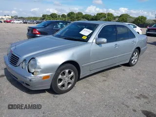 2002 Mercedes-Benz E-Class with VIN WDBJF82J02X070968, listed as a IAAI auction lot 41352216 with 91,704 mi miles. Bid and sale history available at carsss.com. Image 17.