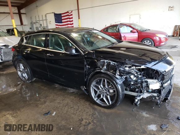 2018 Infiniti QX30 Premium with VIN SJKCH5CP8JA041948, listed as a Copart auction lot 53582513 with 56,915 mi miles and Salvage title. Bid and sale history available at DreamBid. Image 4.