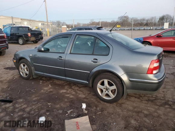 2004 Volkswagen Jetta GL with VIN 3VWRK69M74M002287, listed as a Copart auction lot 46682325 with 104,970 mi miles and Salvage title. Bid and sale history available at DreamBid. Image 2.