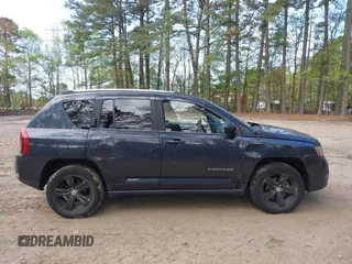 2014 Jeep Compass Sport with VIN 1C4NJDBB5ED776679, listed as a IAAI auction lot 41992146 with 145,706 mi miles. Bid and sale history available at carsss.com. Image 13.