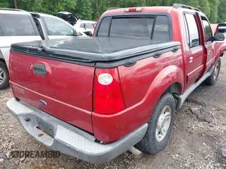 2004 Ford Explorer Sport Trac XLS z VIN 1FMZU77K84UB72038, wystawiony jako IAAI lot #42359818 z przebiegiem 146 619 mil mil oraz . Historia ofert i sprzedaży dostępna na DreamBid. Obrazek 4.