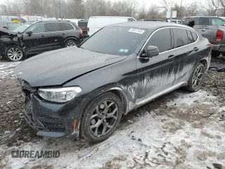 2021 BMW X4 xDrive30i with VIN 5UX2V1C09M9E03649, listed as a Copart auction lot 88647465 with 49,733 mi miles and Salvage Title. Bid and sale history available at carsss.com. Image 1.