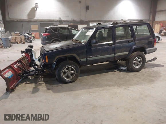 1999 Jeep Cherokee Sport with VIN 1J4FF68S2XL602709, listed as a IAAI auction lot 41177232 with Not Provided miles. Bid and sale history available at carsss.com. Image 2.